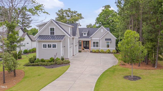 14 Duck Bill Trl, Pittsboro, NC 27312 - modern farmhouse style home featuring board and batten siding, driveway, and a front lawn