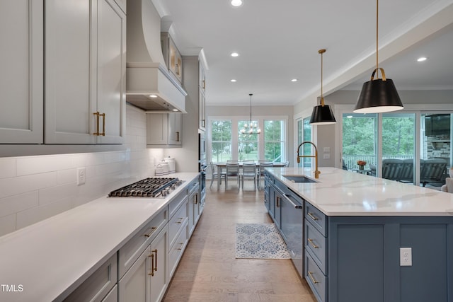 14 Duck Bill Trl, Pittsboro, NC 27312 - kitchen featuring a sink, premium range hood, stainless steel appliances, recessed lighting, and tasteful backsplash