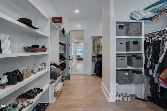 14 Duck Bill Trl, Pittsboro, NC 27312 - walk in closet with light wood-style flooring