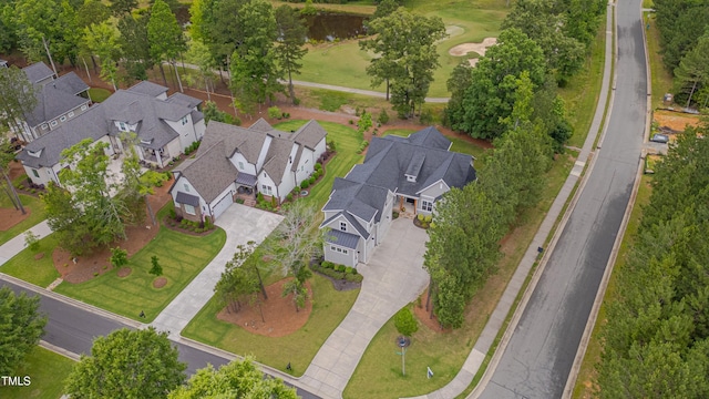 14 Duck Bill Trl, Pittsboro, NC 27312 - aerial view of property and surrounding area featuring nearby suburban area and a golf course