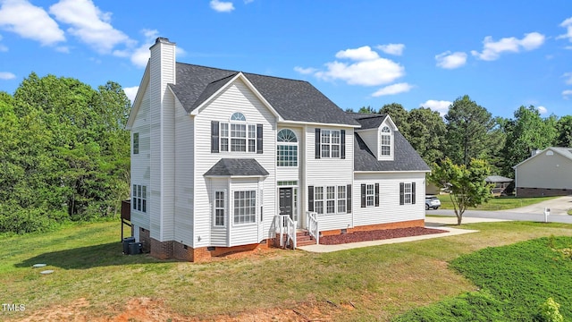 1308 Aspen Falls Ct, Willow Springs, NC 27592 - back of property with roof with shingles, crawl space, a chimney, central air condition unit, and a yard