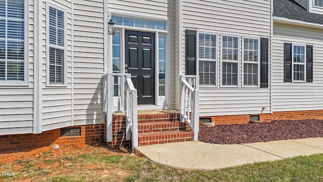 1308 Aspen Falls Ct, Willow Springs, NC 27592 - view of exterior entry with a shingled roof and crawl space