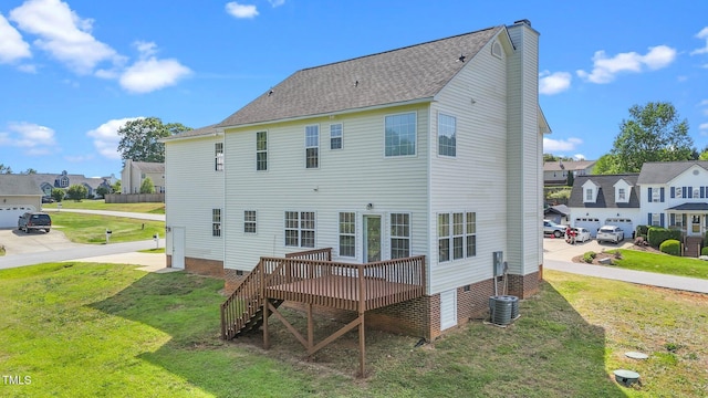 1308 Aspen Falls Ct, Willow Springs, NC 27592 - back of house featuring a chimney, a lawn, a residential view, a wooden deck, and a shingled roof