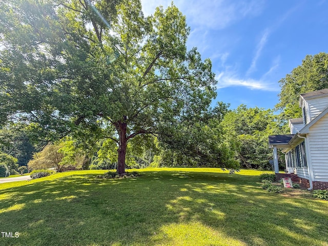 30 Shannon Rd, Timberlake, NC 27583 - view of grassy yard featuring view of scattered trees