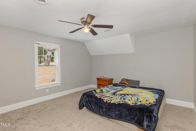 4610 Pinehurst Dr N, Wilson, NC 27896 - carpeted bedroom featuring baseboards, a ceiling fan, and vaulted ceiling