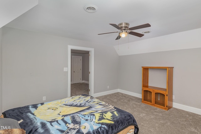 4610 Pinehurst Dr N, Wilson, NC 27896 - carpeted bedroom with baseboards, lofted ceiling, and a ceiling fan