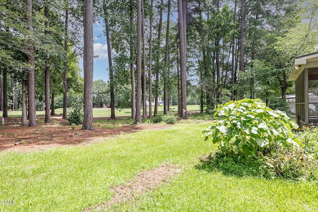 4610 Pinehurst Dr N, Wilson, NC 27896 - view of grassy yard featuring view of scattered trees