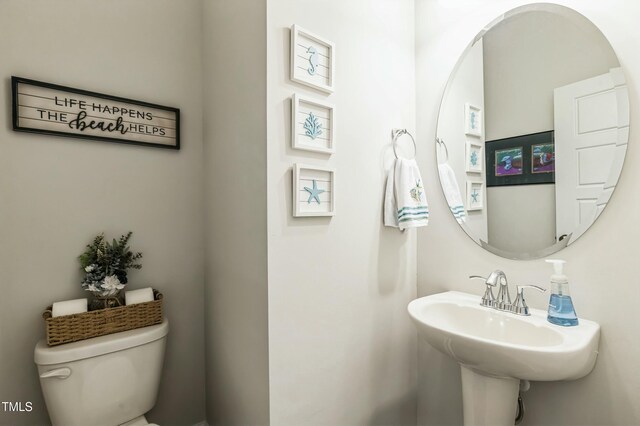bathroom featuring toilet