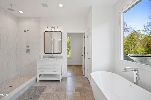 1200 Roosevelt Dr, Chapel Hill, NC 27514 - full bathroom with plenty of natural light, vanity, and a tile shower
