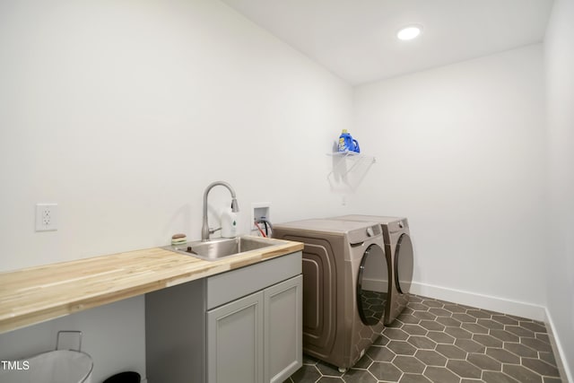 1200 Roosevelt Dr, Chapel Hill, NC 27514 - washroom featuring baseboards, separate washer and dryer, a sink, recessed lighting, and cabinet space