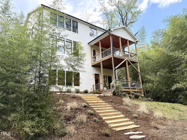 1200 Roosevelt Dr, Chapel Hill, NC 27514 - rear view of house with stairway and a balcony