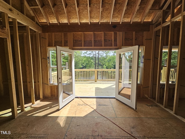 unfurnished sunroom with plenty of natural light
