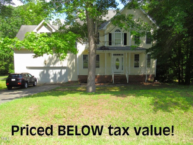 1623 Rogers Pointe Ln, Creedmoor, NC 27522 - view of front of home featuring covered porch, driveway, and a front yard