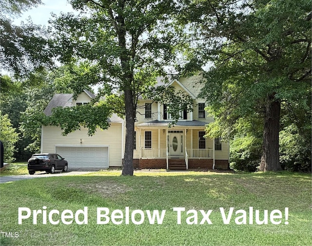 1623 Rogers Pointe Ln, Creedmoor, NC 27522 - view of front of home with covered porch, a front yard, and driveway
