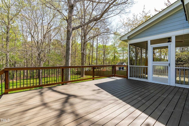 wooden terrace with a sunroom