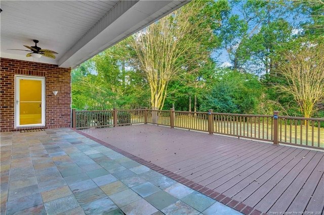 deck featuring a patio and a ceiling fan