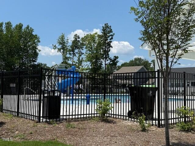237 Shingle Oak Rd, Wake Forest, NC 27587 - gate featuring a community pool