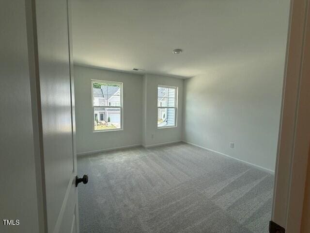 237 Shingle Oak Rd, Wake Forest, NC 27587 - carpeted empty room with baseboards