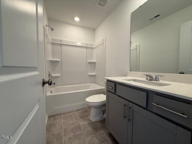 237 Shingle Oak Rd, Wake Forest, NC 27587 - bathroom featuring vanity, bathtub / shower combination, recessed lighting, and tile patterned floors