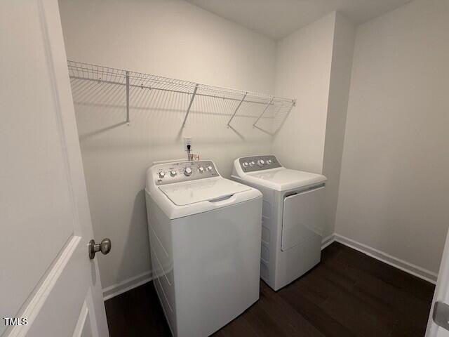 237 Shingle Oak Rd, Wake Forest, NC 27587 - laundry room featuring separate washer and dryer and dark wood-style flooring
