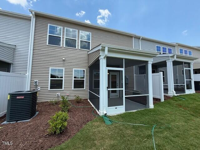 237 Shingle Oak Rd, Wake Forest, NC 27587 - back of property featuring a sunroom and a yard