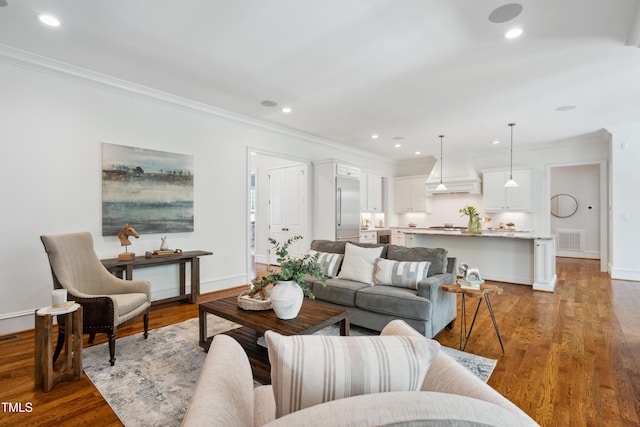 325 Forest Bridge Rd, Youngsville, NC 27596 - living area with ornamental molding, recessed lighting, baseboards, and wood finished floors