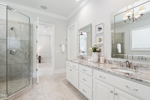 325 Forest Bridge Rd, Youngsville, NC 27596 - bathroom with double vanity, a stall shower, ornamental molding, a chandelier, and tile patterned flooring