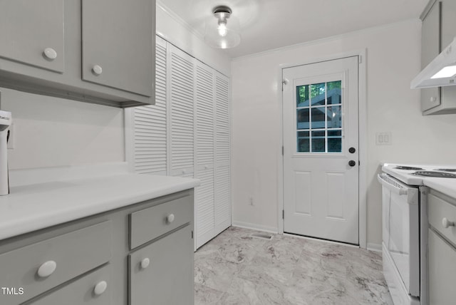 1332 Stallings Rd, Chapel Hill, NC 27516 - laundry area with light marble finish flooring, ornamental molding, and baseboards