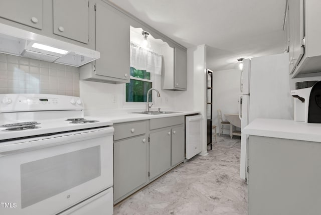 1332 Stallings Rd, Chapel Hill, NC 27516 - kitchen featuring white appliances, gray cabinetry, under cabinet range hood, a sink, and tasteful backsplash