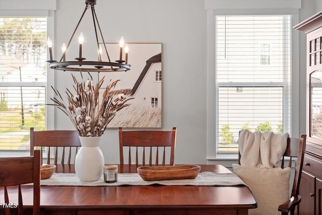 7616 Hasentree Way, Wake Forest, NC 27587 - dining space with a wealth of natural light and a chandelier
