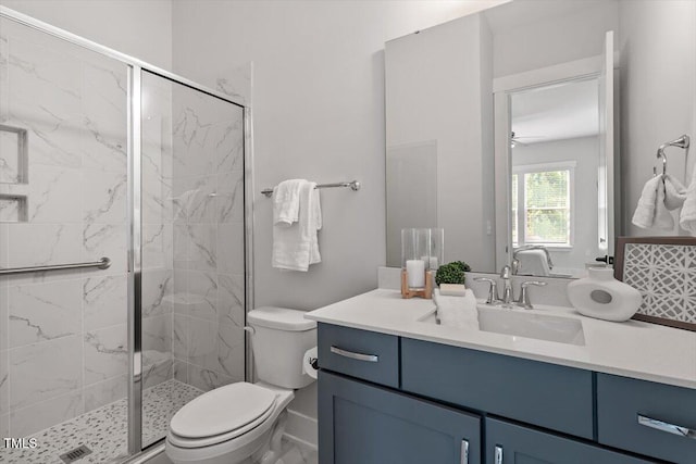 7616 Hasentree Way, Wake Forest, NC 27587 - bathroom with a marble finish shower, vanity, and toilet