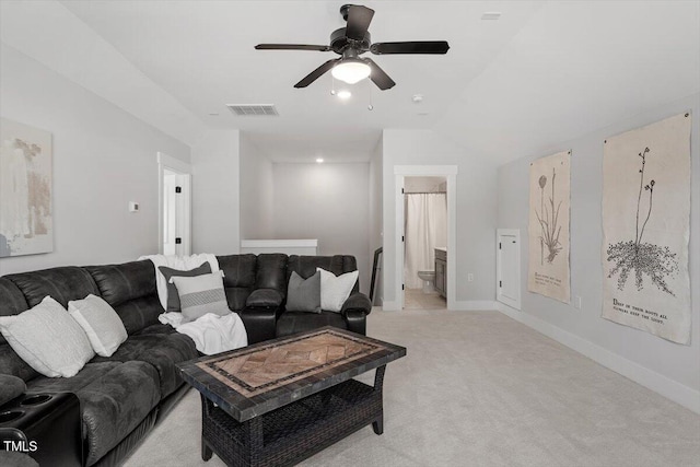 7616 Hasentree Way, Wake Forest, NC 27587 - living area featuring ceiling fan, visible vents, baseboards, lofted ceiling, and light carpet