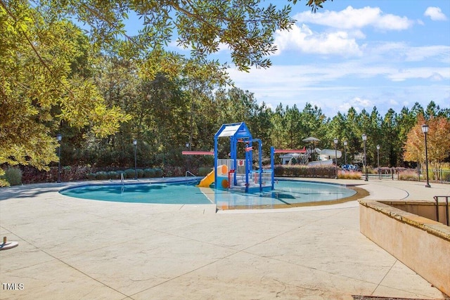 7616 Hasentree Way, Wake Forest, NC 27587 - view of play area featuring a community pool and a water play area