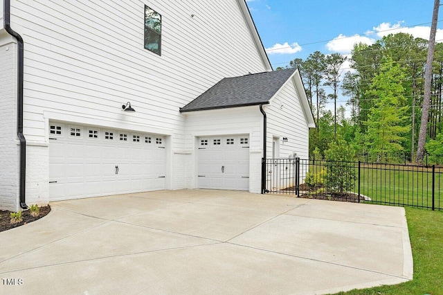 7616 Hasentree Way, Wake Forest, NC 27587 - garage with fence and concrete driveway