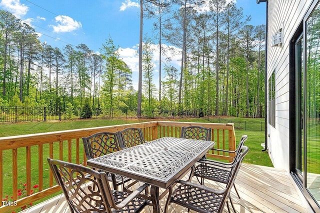 7616 Hasentree Way, Wake Forest, NC 27587 - wooden deck with a yard, outdoor dining area, and a fenced backyard