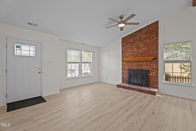2941 Golden Oak Ct, Raleigh, NC 27603 - unfurnished living room featuring visible vents, ceiling fan, wood finished floors, and lofted ceiling