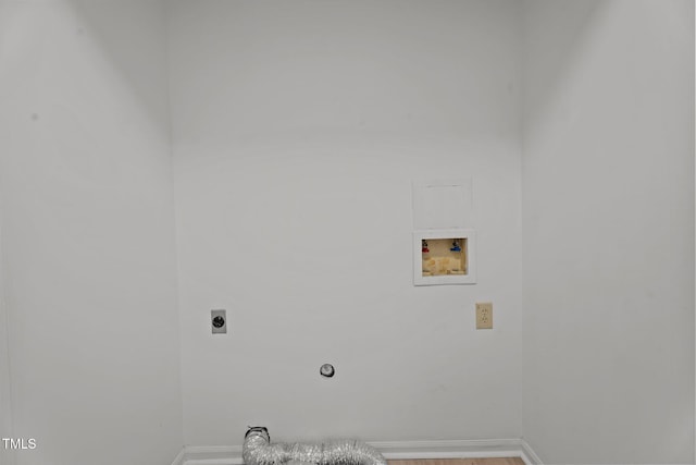 2941 Golden Oak Ct, Raleigh, NC 27603 - washroom featuring baseboards, electric dryer hookup, laundry area, and washer hookup