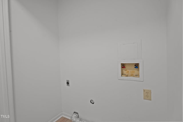 2941 Golden Oak Ct, Raleigh, NC 27603 - laundry room featuring hookup for an electric dryer, baseboards, washer hookup, laundry area, and wood finished floors
