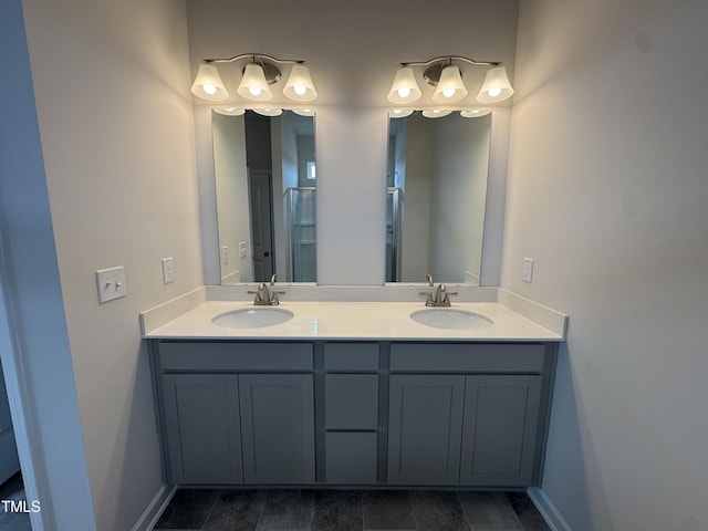 168 Bruce Dr, Dunn, NC 28334 - full bathroom with double vanity and baseboards