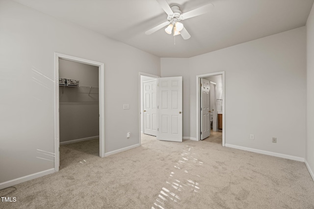 1116 Silky Dogwood Trl, Apex, NC 27502 - unfurnished bedroom with a walk in closet, ensuite bath, carpet, baseboards, and a closet