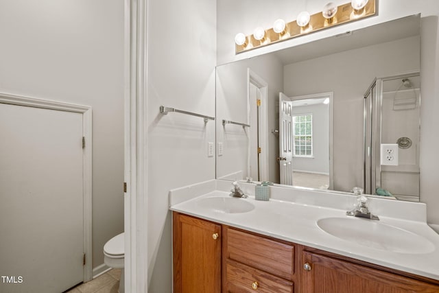 1116 Silky Dogwood Trl, Apex, NC 27502 - full bathroom featuring double vanity, toilet, a shower stall, and a sink