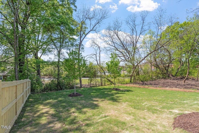view of yard with fence