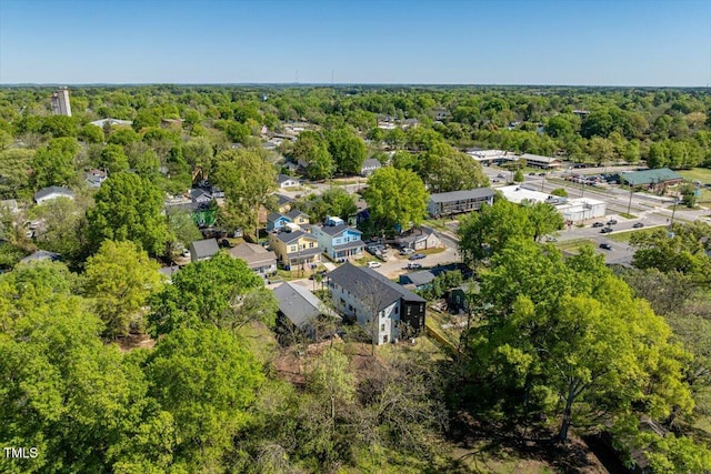 aerial view with a wooded view