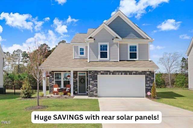 825 Golden Plum Ln, Zebulon, NC 27597 - craftsman-style house featuring driveway, a garage, stone siding, and covered porch