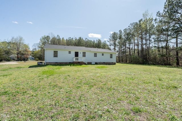 162 Valley Rd, Warrenton, NC 27589 - back of house with a lawn and crawl space