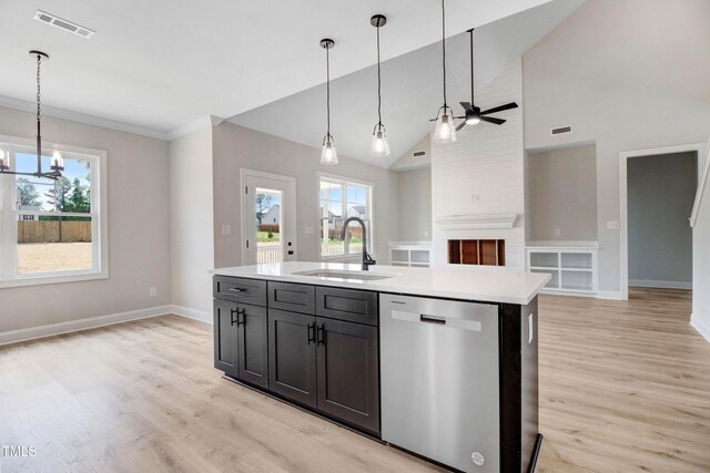 186 Gumtop Dr, Zebulon, NC 27597 - kitchen with dishwasher, a sink, light wood-type flooring, light countertops, and ornamental molding
