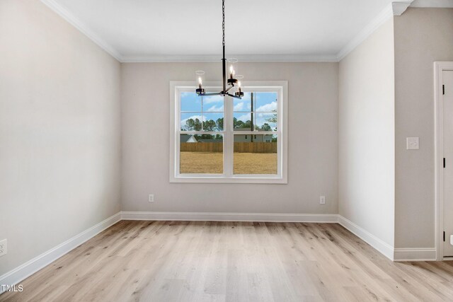 186 Gumtop Dr, Zebulon, NC 27597 - unfurnished dining area featuring a chandelier, light wood finished floors, crown molding, and baseboards