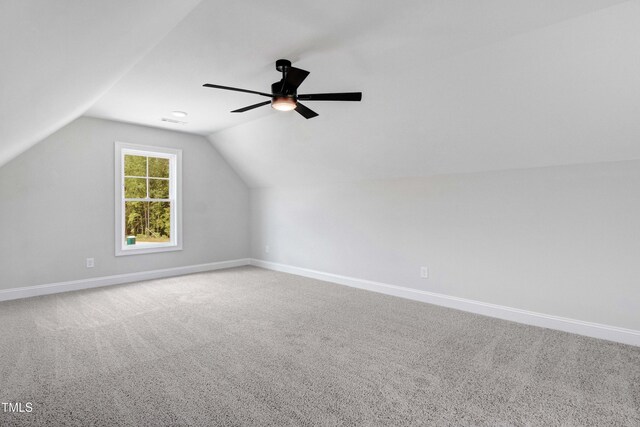 186 Gumtop Dr, Zebulon, NC 27597 - bonus room featuring baseboards, lofted ceiling, carpet flooring, and ceiling fan