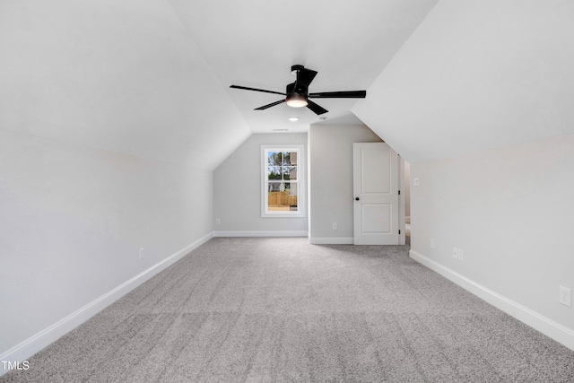 186 Gumtop Dr, Zebulon, NC 27597 - additional living space with baseboards, lofted ceiling, carpet flooring, and ceiling fan