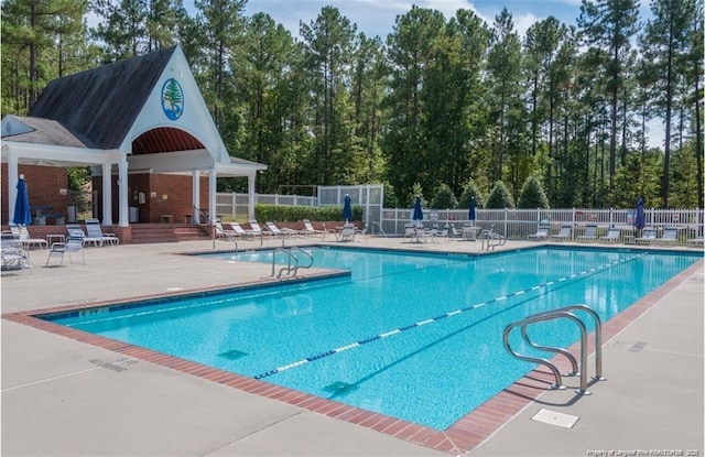 1477 Micahs Way N, Spring Lake, NC 28390 - community pool featuring a patio area